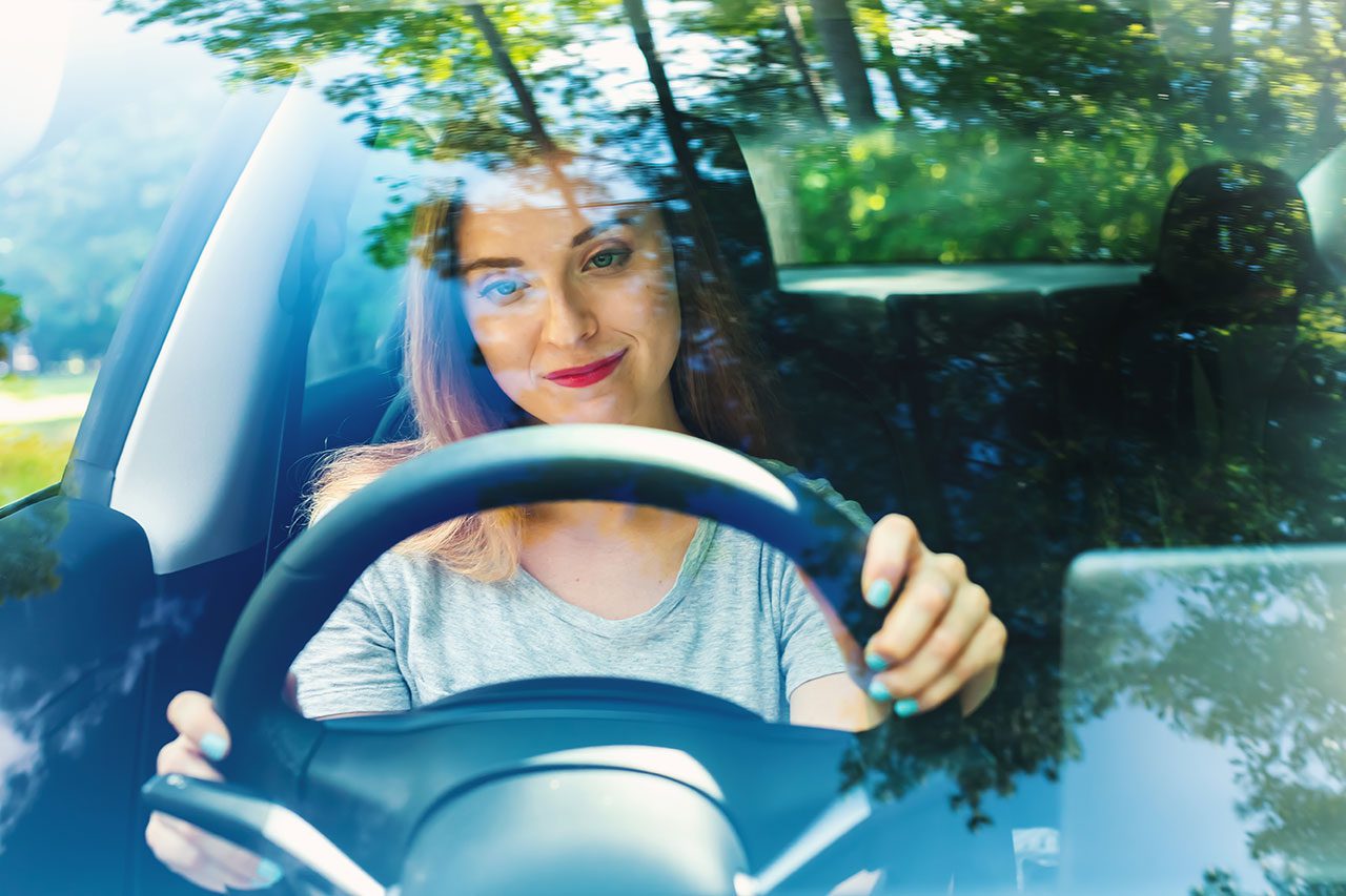 Lady driving a car